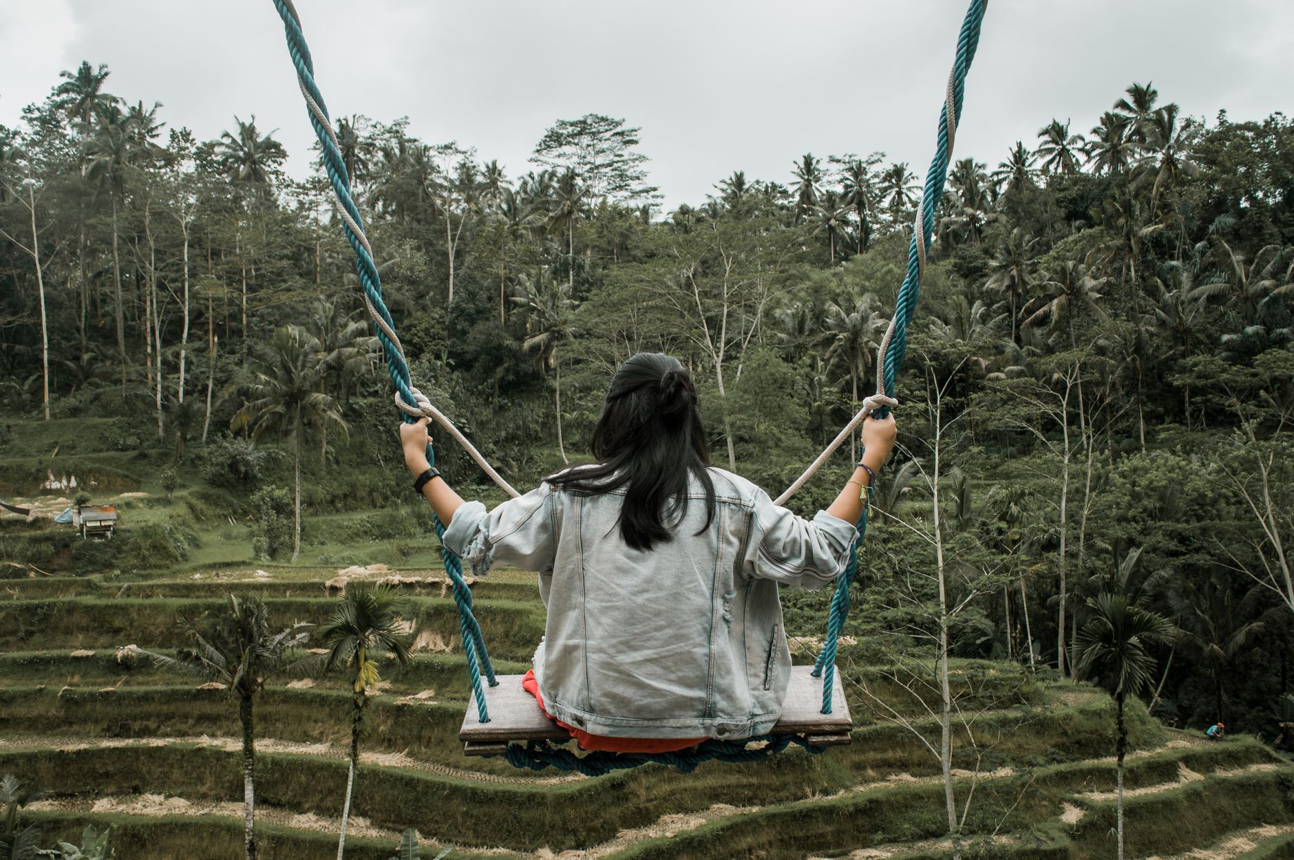 woman sitting on a swing